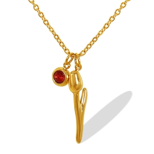 18k gold-plated stainless steel tulip necklace with red crystal pendant on white background