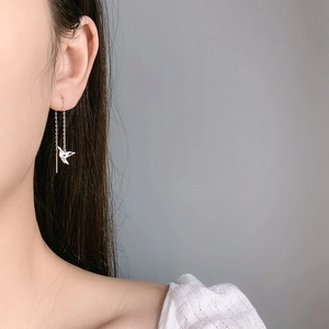 Elegant paper crane drop earrings for women with minimalist long tassel in silver finish