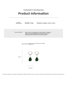 Detailed view of emerald green drop earrings with dimensions of 3cm and 8.6g weight