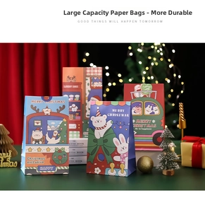 Detailed view of spacious Christmas gift bags with festive Santa and polar bear illustrations