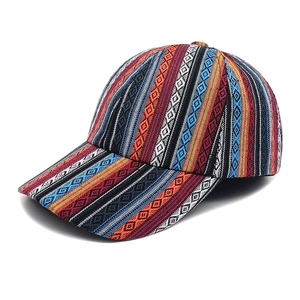 Detailed view of bohemian style woven texture and ethnic colorful patterns on baseball cap