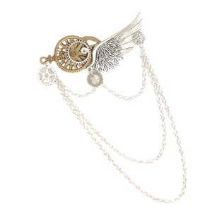 Steampunk gear wing brooch with metallic chains and vintage silver finish on white background