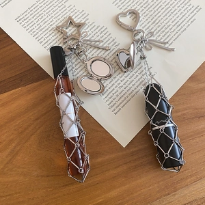 Detailed view of silver mesh lipstick holder charm with heart mirror and star pendants