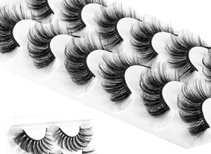 Detailed view of 6 pairs natural thick 8D faux mink eyelashes on a white tray