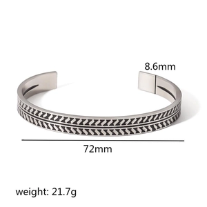 Vintage arrow silver stainless steel open bangle with textured weave pattern detail