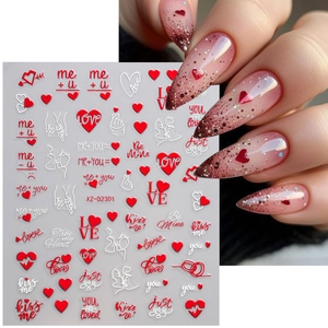 Detail of heart pattern nail stickers with romantic red and white designs for manicures