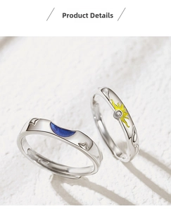 Detail of sun and moon couple rings with blue enamel moon and yellow sun zircon