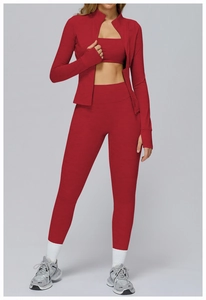 Close-up of wine red long sleeve jacket and high waist leggings in stretch knit fabric