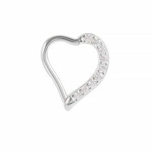 Macro view of heart-shaped S925 sterling silver earring with sparkling small diamonds