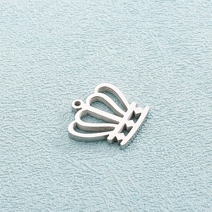 Intricate hollow crown pendant in silver stainless steel finish with hanging loop