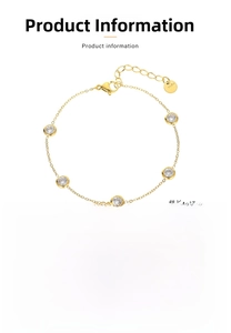 Detail of vintage gold-plated steel bracelet with five round-cut cubic zirconia settings