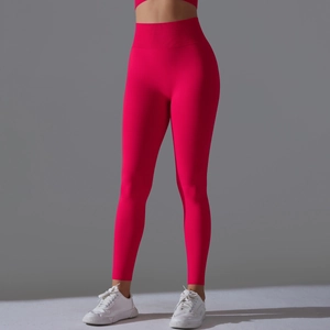 Detail view of seamless high waist rose red yoga leggings with body shaping effect