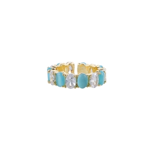 Adjustable gold ring featuring alternating turquoise and clear oval cubic zirconia stones