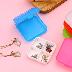 Portable 4-compartment plastic pill box in various colors for medicine storage