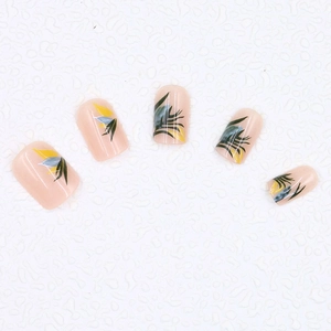 Detailed view of hand-painted tropical green leaf patterns on press-on toenails