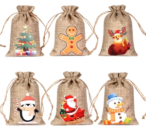 Detail showing 6 Christmas burlap drawstring bags with reindeer and Santa prints