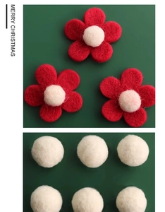 Detail of red wool felt flowers and white felt balls for Christmas DIY crafts