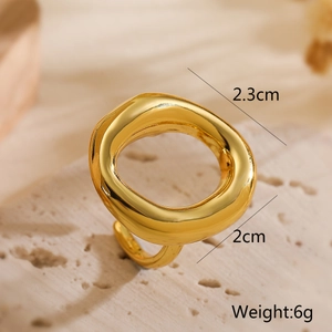 Detailed view of an irregular organic gold-plated ring showing 2.3cm by 2cm dimensions