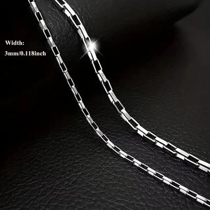 Detailed close-up of 3mm wide silver titanium steel box chain on black leather
