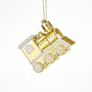 Golden train Christmas ornament with white glitter accents on a clean white background