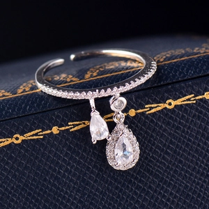 Elegant adjustable silver ring with sparkling teardrop zircons and thin paved band