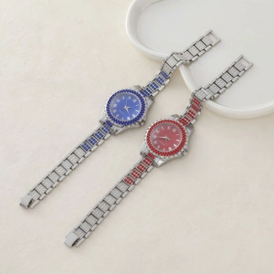Luxury women's quartz watch with full crystal chain strap in vibrant red and blue colors