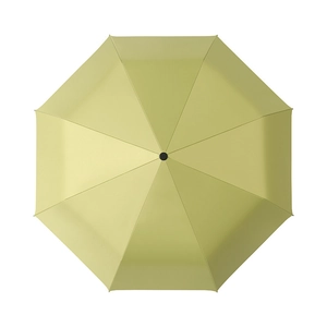 Top view of yellow-green sun umbrella with 8 sturdy ribs fully open on white background