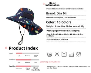 Detail view of quick-dry sun hat showing neck flap, chin strap, and colorful dinosaur print