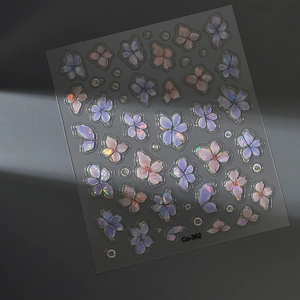 Macro detail of 5D jelly embossed floral nail stickers with holographic laser coating