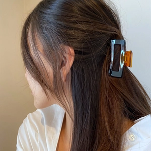 Minimalist square large hair claw clip in dark translucent finish for bun hair styling