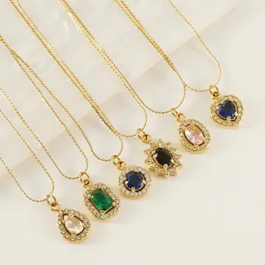 Collares de acero al titanio dorado con varios colgantes de circón de colores y halo de cristal