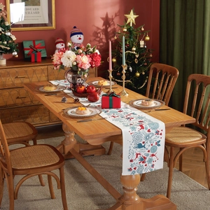 Modern Christmas table runner with festive elk and floral patterns on a thick cotton-poly fabric