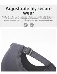 Detail of adjustable metal buckle and dark gray twill fabric on the rear of baseball cap