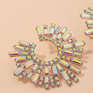Exaggerated golden C-shaped sunburst earrings with colorful iridescent AB rhinestones
