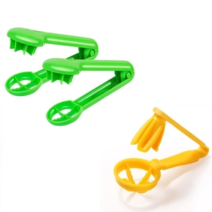 Three plastic fruit slicers in green and yellow for even cutting of tomatoes and grapes