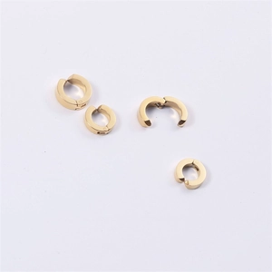 Detail showing the spring-loaded opening mechanism on gold minimalist ear cuffs