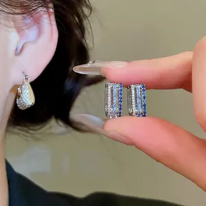 Three-layer square hoop earrings with sparkling white and deep blue cubic zirconia stones