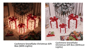 Detail of lit and unlit Christmas gift box set with plush snow pattern and red velvet bows