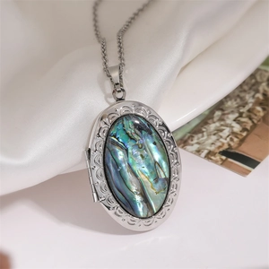 Vintage oval silver locket necklace with natural colorful abalone shell inlay on silk