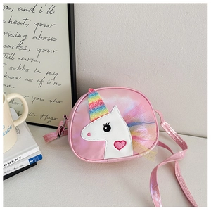 Close-up of pink unicorn girls crossbody bag with glitter horn and mesh mane details