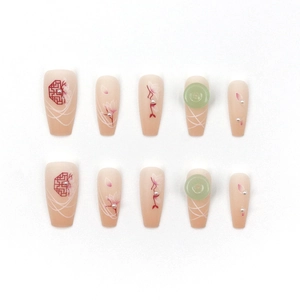 Chinese style press-on nails with red flower lattice patterns and pearl accents