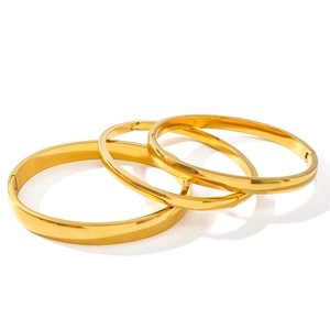 Three-piece minimalist gold-plated stainless steel bangles with polished mirror finish
