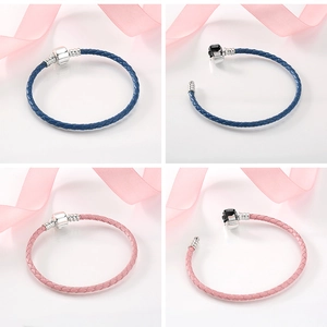 Detailed views of blue and pink woven leather bracelets with S925 silver barrel clasps