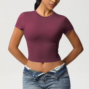 Close-up of slim-fit wine red short sleeve yoga crop top with high elasticity fabric