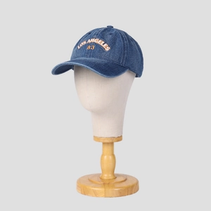 Navy blue denim baseball cap featuring orange and white Los Angeles 83 embroidery