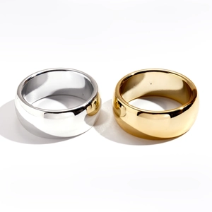 Polished silver and gold minimalist wide band geometric round bracelets in mirror finish