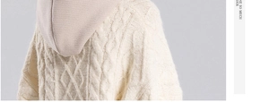 Primer plano del tejido de punto trenzado blanco roto de un gorro térmico de invierno