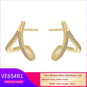 Macro shot of V-shaped 18K white gold plated brass earrings with micro-pave cubic zirconia