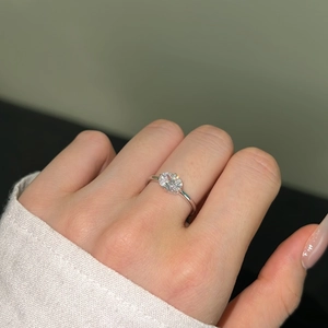 Close-up of elegant S925 silver ring featuring a large oval-cut zircon stone on finger