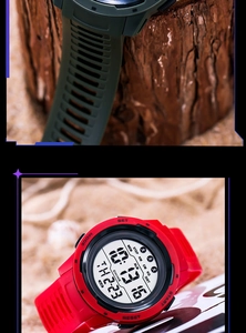 Detail view of digital sport watches in army green and red with outdoor scenery